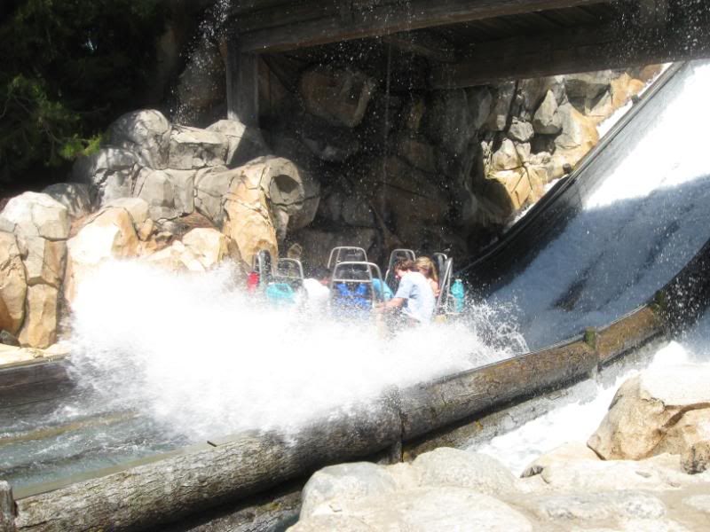 A group of rafters concluding their journey splashing down from the final falls on the Grizzly River Run white water adventure.