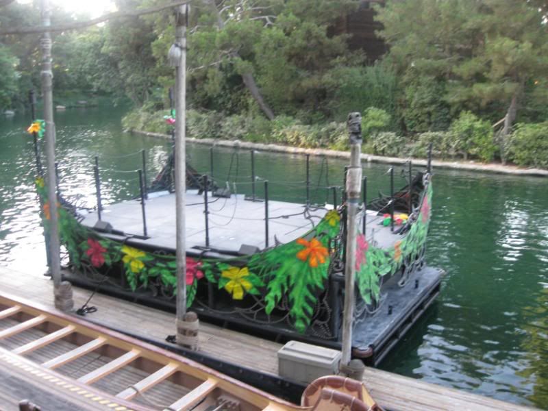 These are the barges that is used for Fantasmic! each night.  It serves the boat for the Jungle Book monkeys scene as well as the Princess scene.  You can see how the leaves are just neon colors that are shot with UVs to create the glowing effect and then the LED flowers under it that are lit up during the Princess.  King Louis thrown is also Aierels rock.
