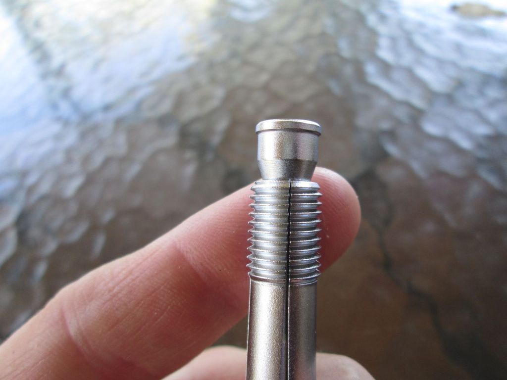 Fixing a cross threaded spark plug hole from the outside